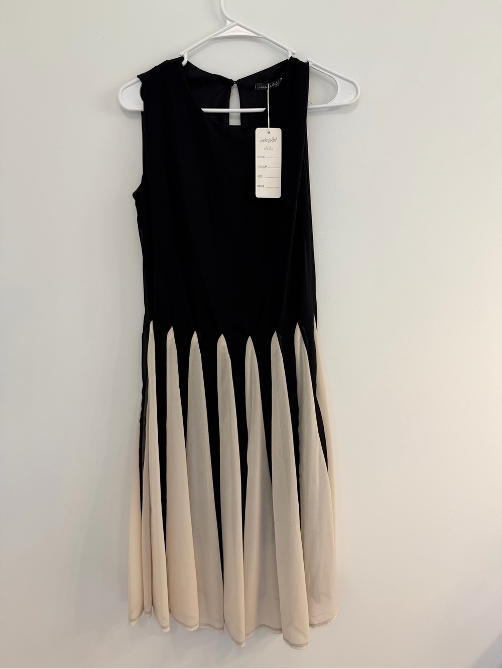 Sleeveless Black and Cream Pleated Midi Dress
